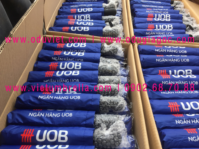xưởng sản xuất ô dù cầm tay in logo quảng cáo